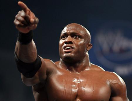 BOBBY LASHLEY VS BOOKER T EN CAGE